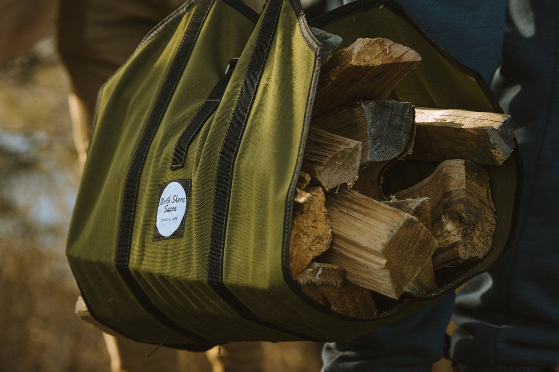 Essential North Shore sauna accessories laid out, including bucket, ladle, and stove protective plate