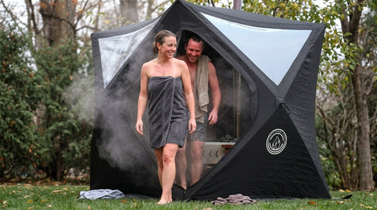 people coming out of a North Shore Sauna Mini Cube sauna tent