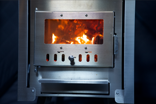 A fire burning in a North Shore Sauna stove