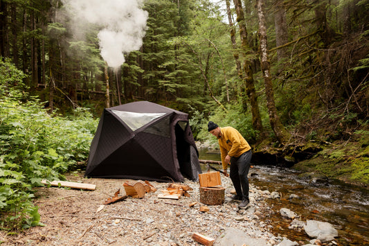 North Shore Sauna tent heating up beside a river, lake, or forest scene.